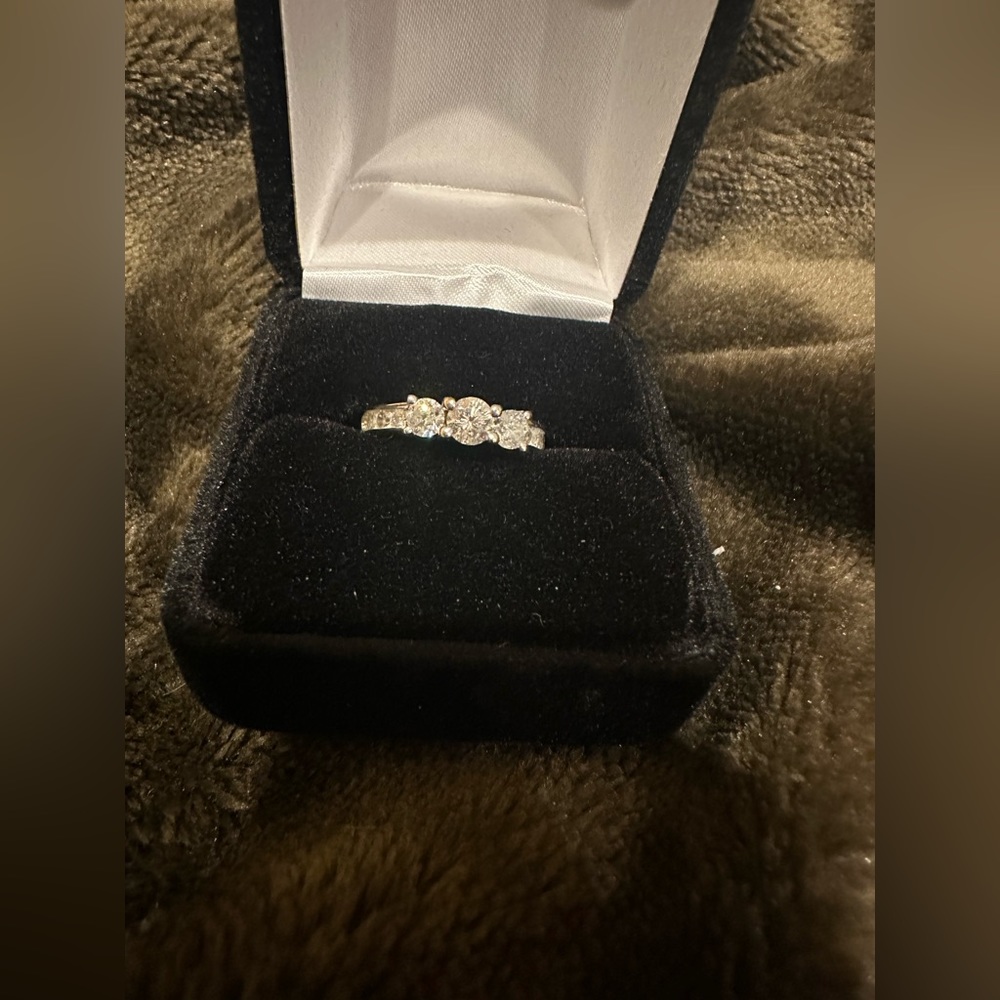 Zales Round cut past, present and future ring.